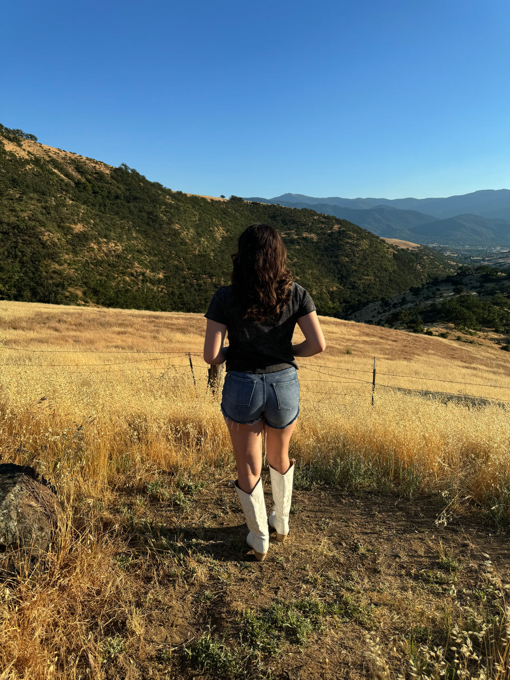 Mineral washed lettuce hem knit top