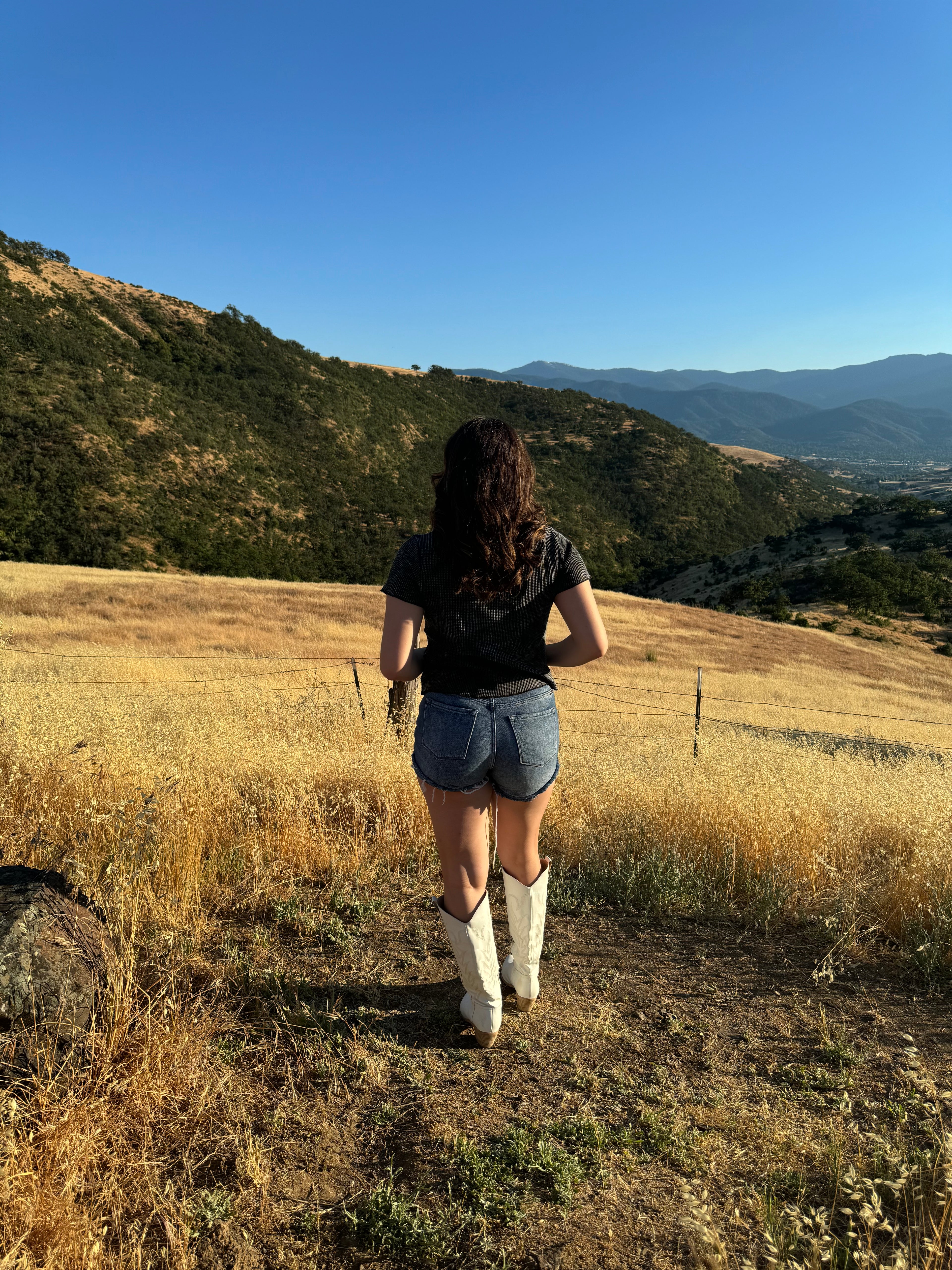 Mineral washed lettuce hem knit top